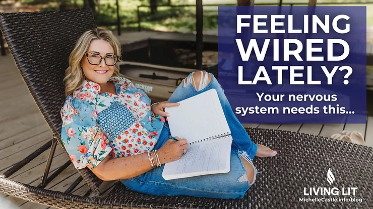 Michelle in floral shirt writing in notebook on wicker chair, smiling. Text says: "Feeling wired lately? Your nervous system needs this..."