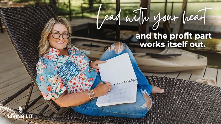 Michelle in floral shirt, sitting on wicker chair with notebook, journaling. Text: "Lead with your heart and the profit part works itself out."